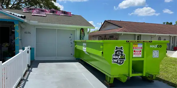 Shingle Roofing Disposal by MAXCO Dumpsters in New Port Richey FL