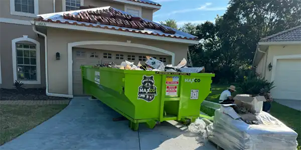 Tile Roofing Disposal by MAXCO Dumpsters in New Port Richey FL